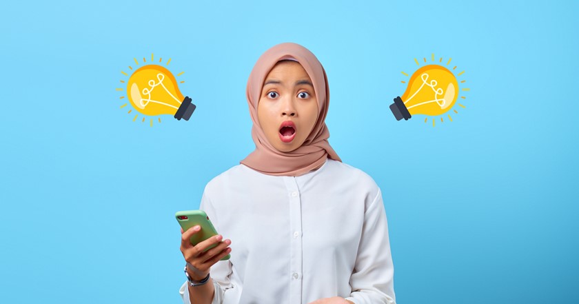 young person in hijab having lightbulb moment of inspiration