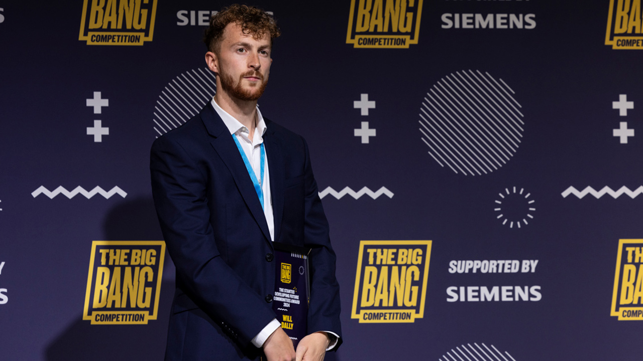 Will Dally, winner of the Stantec Helping Future Communities Award in the 2024 Big Bang Competition, standing with his award.