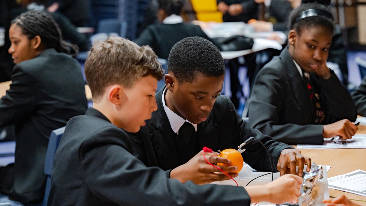 Boys in classroom in energy experiment