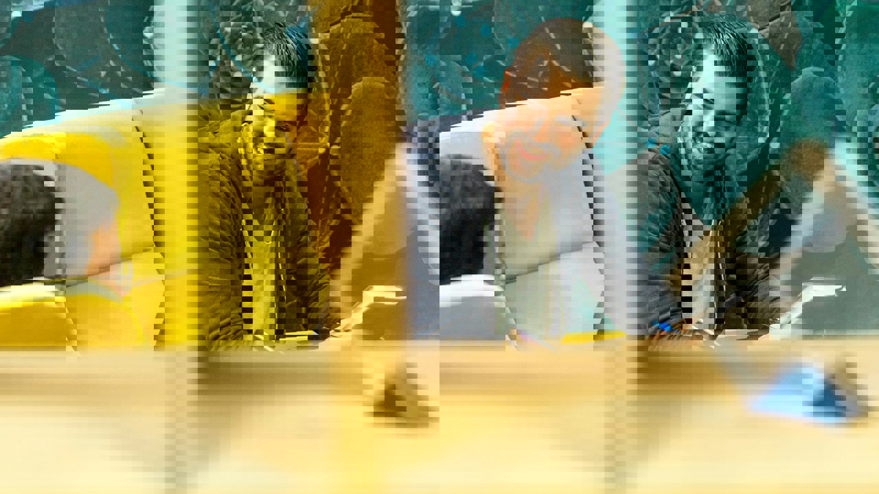 Business professional smiling and talking in a meeting