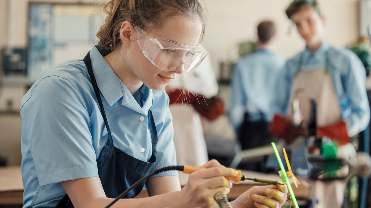 Secondary school girl in design and technology lesson