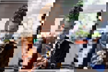 Young person in school science lab conducting an experiment