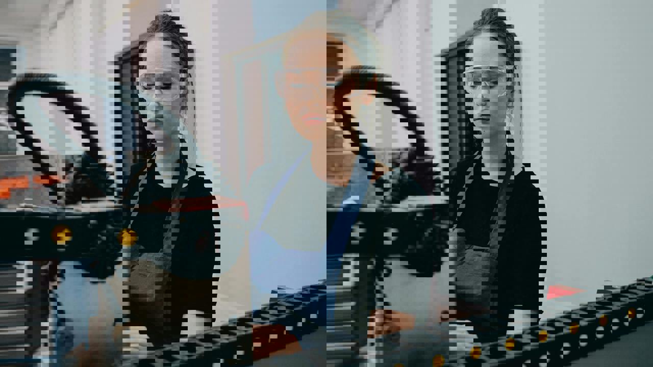 An engineer works with machinery 