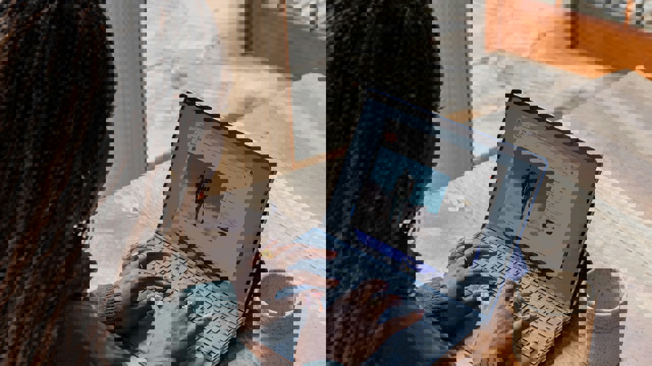 Women typing on a laptop