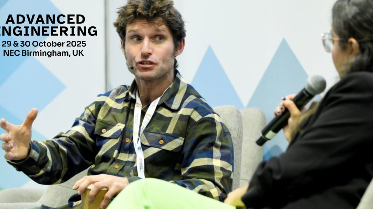 Man being interviewed as part of conference panel