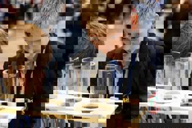 Young people interact with exhibits and stands and activities at The Big Bang Fair