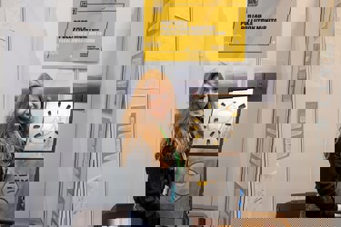 student showing Big Bang Competition project