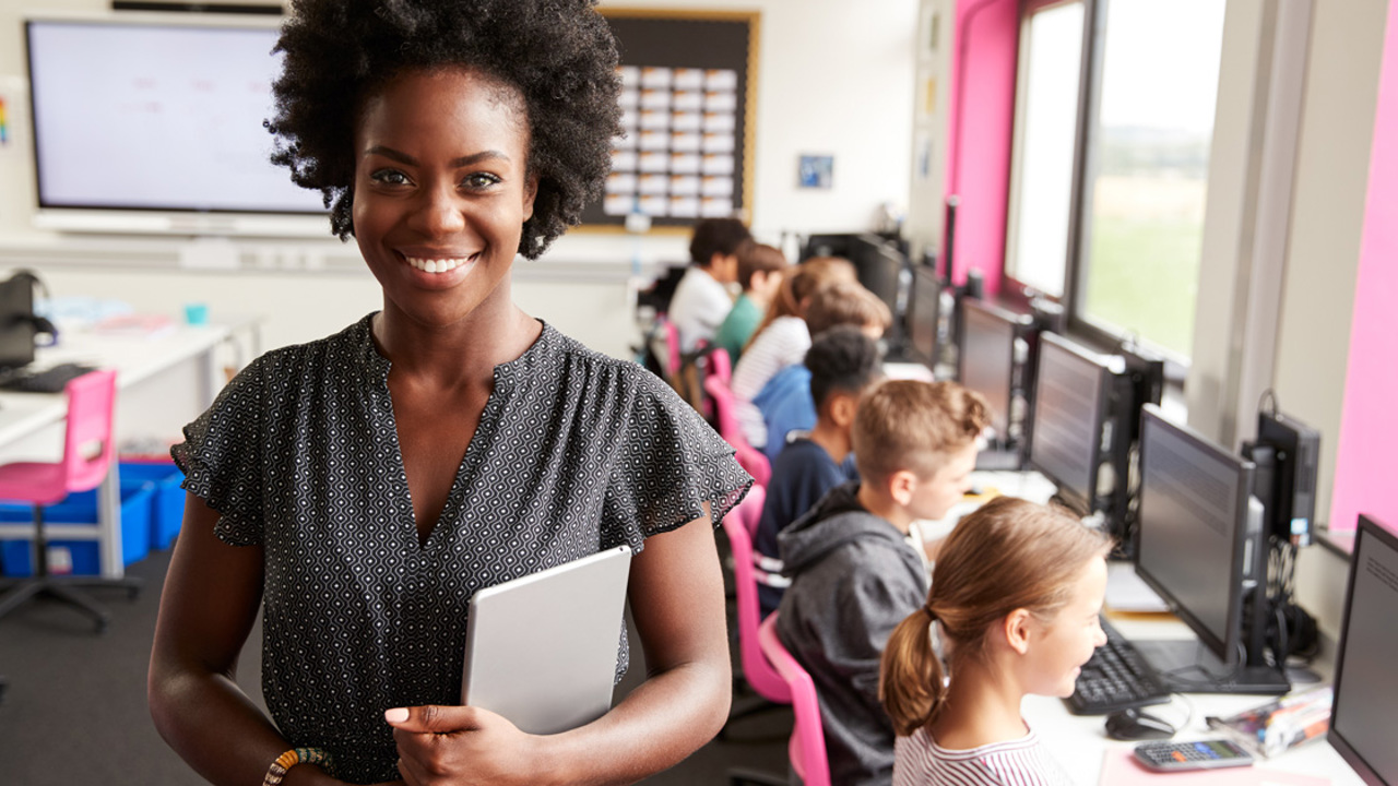 A female teacher in a primary school classroom